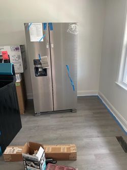 Stainless Steel Side-by-Side Refrigerator with Ice Dispenser