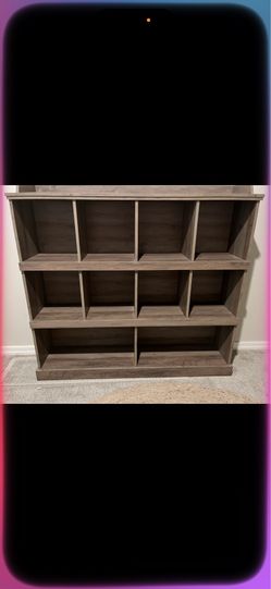 Book shelf about 5th tall with 10 cubes