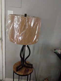 2 lamps and a rustic style stand