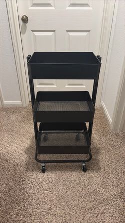Black metal utility cart