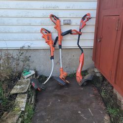 Two Black+Decker And One Grasshog Weedwacker