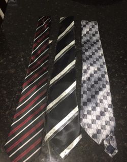 Man's silk tie all of them new and selling all of them