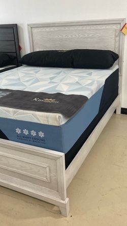 White queen size wooded bed frame