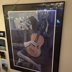 Pablo Picasso’s - The Guitarist 