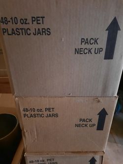 Unopened Boxes of Plastic Jars