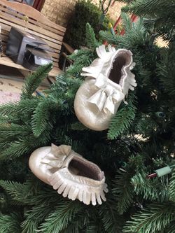 Silver baby moccasins