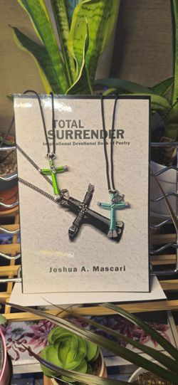 Book, 2 handmade cross necklaces