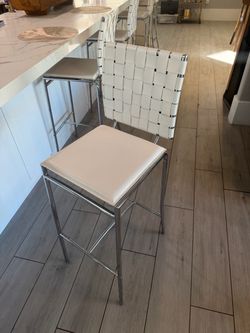 White leather barstools