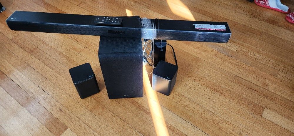 LG 2.1 Channel sound bar, wireless subwoofer and rear speakers