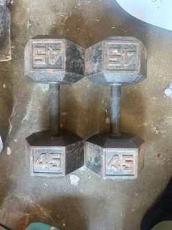 A pair of 45 lb dumbbells