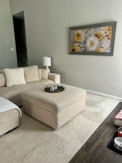 Beige Courdroy Sectional With Throw Pillow