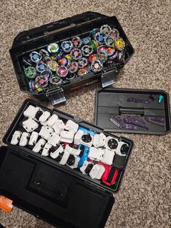 Large Beyblade Burst Collection with Launchers and Cases