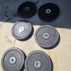 Very nice olympic bumper weight plates. 45s 10s. $1 a lb 45s 10s Also Olympic iron weight plates $1 a lb 45s 35s 25s 10s 5s