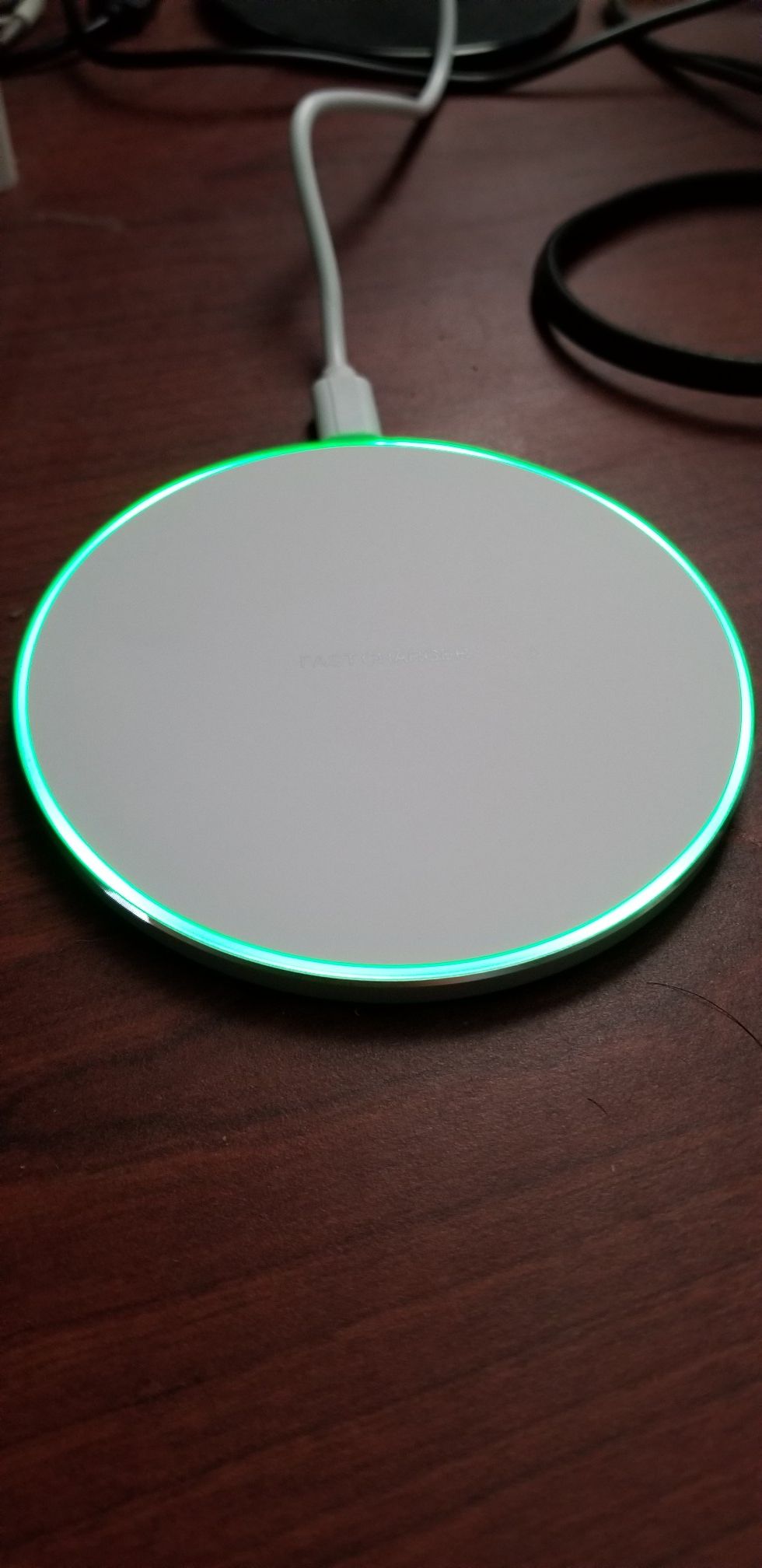 Wireless charger for smartphones