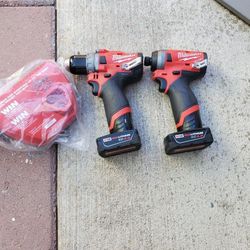 set of new milwaukee drills with 4AH battery and all new charger.