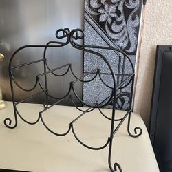Black metal wine rack