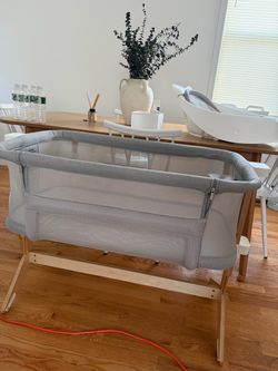 Newton Bassinet & Bedside Sleeper in color grey.