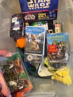 Box of mixed vintage toy and videos vintage cars