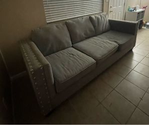Gray Fabric Sofa with Nailhead Trim