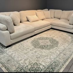 I'm selling a new modular sectional sofa.