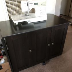 Sewing machine and sewing table