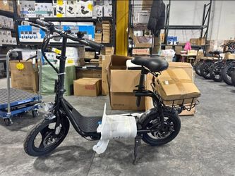 Caroma foldable adult electric commuter scooter with an adjustable seat and rear storage basket.