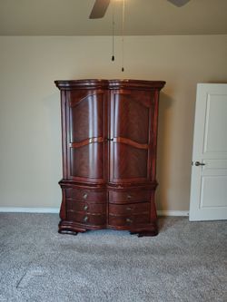 Gently used oak Armoire