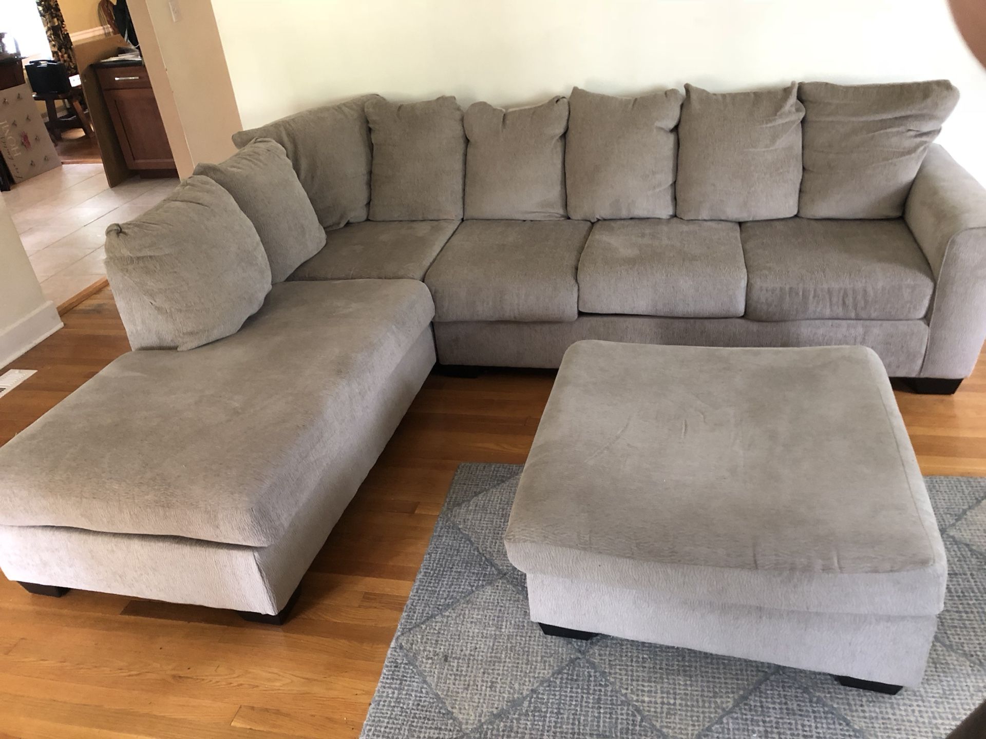 Ashley Ellabury Sectional and Ottoman 5 months old