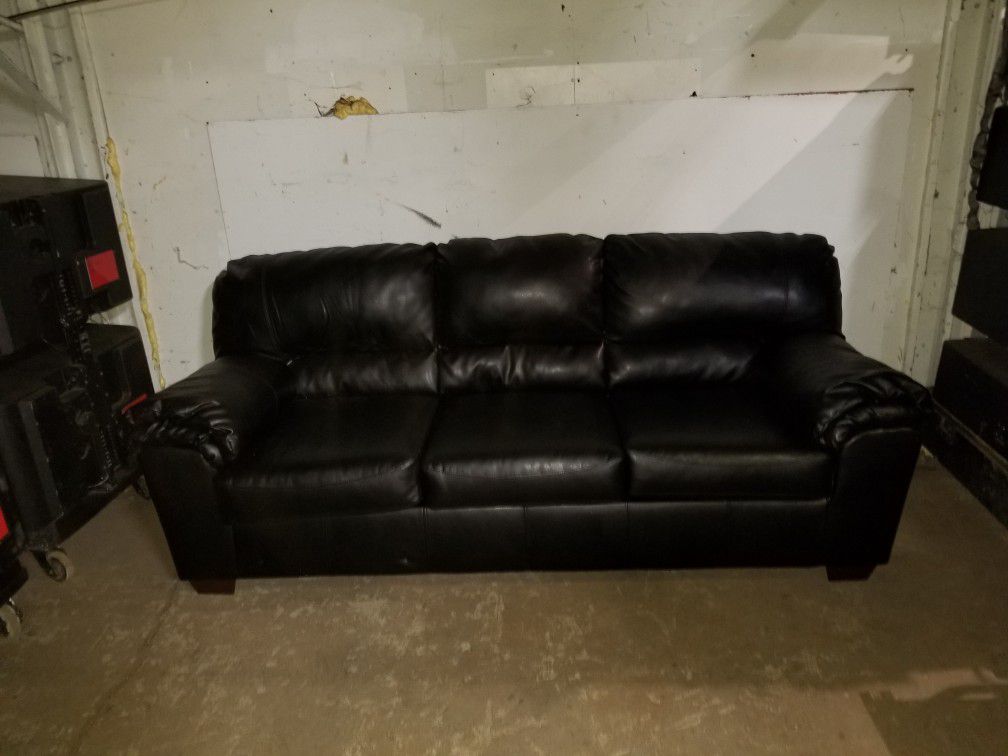 Black leather couch like new