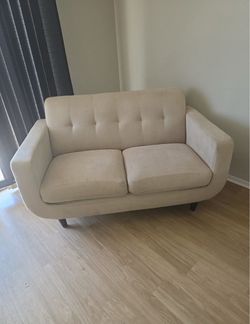 Beige love seats
