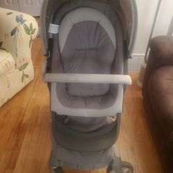 Stokke Xplory Stroller with Bassinet/Carry Cot, Changing Bag, Rain Guard, and Mosquito Net 