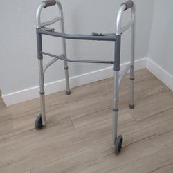 Dual Release Folding Walker