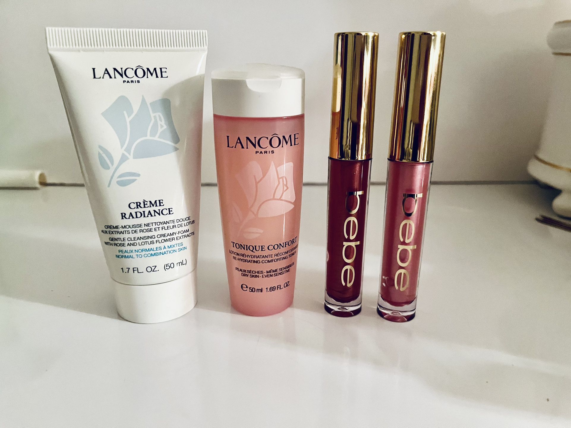 Makeup And Skin Care Bundle All Brand New. Lancôme/Bebe Brands..  * Lancôme cream radiance gentle cleansing creamy foam.  * Lancôme tonique confort lo