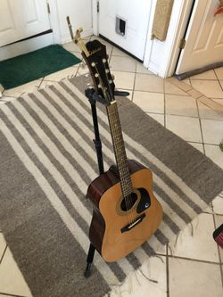 Epiphone DR-100 Acoustic Guitar with stand and capo