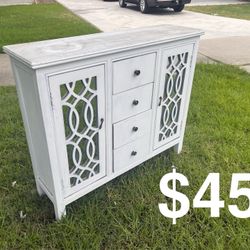 Distressed White 4-Drawer Sideboard with Mirrored Lattice Doors