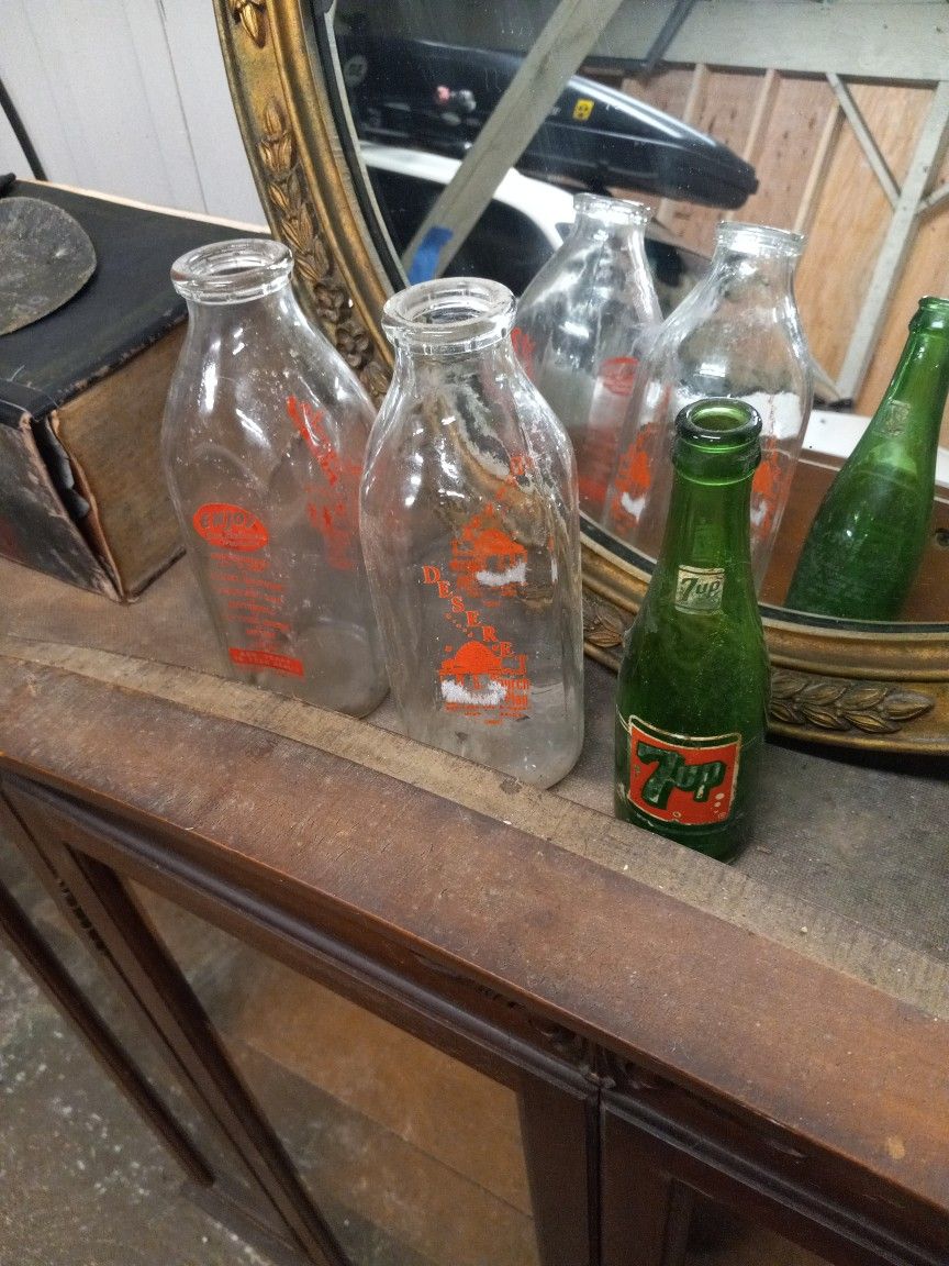 Vintage One Quart Milk Bottles And A 7-Up Bottle