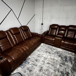 Brand New Luxury Leather Set Power Recliner, Massage , And Heaters. Retails At Ashley For $5700
