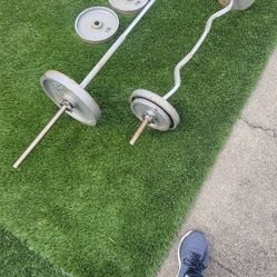 Exercise Equipment 2 Plates Of 25  4 Plates Of 10 ,2 Of 5 and 2 Big Bars 