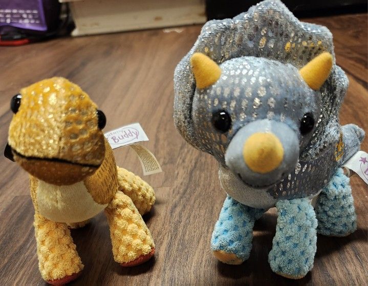 NWOT 2 Clip-On Scentsy Buddies-Terra the Triceratops & Serra the Stegasaurus w Tropic Tango Fragrance, both in flawless condition