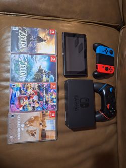 Nintendo Switch. 2 Controllers.  4 games