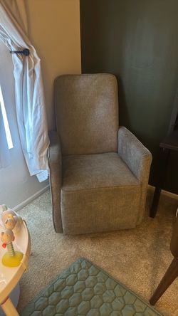 Gray Upholstered Rocking Chair – $40