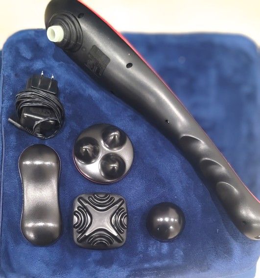 A Wahl Hand Held massager.