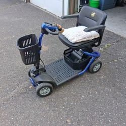 Electric four wheel scooter.
