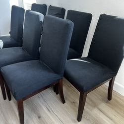 set of 7 black faux leather dining chairs with slip covers maple wood legs full back bundle lot