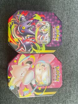 Mega Moonlit Tin featuring Mega Gengar ex and Mega Clefable ex.