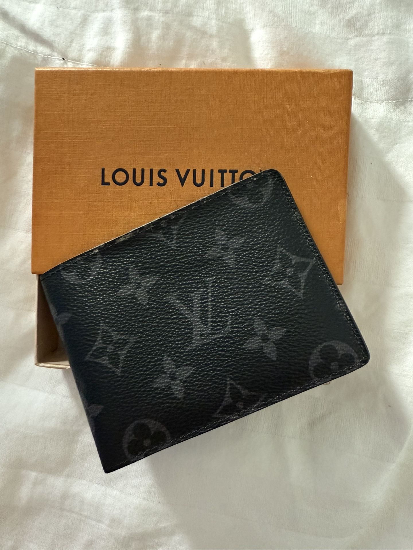 Louis Vuitton, leather wallet