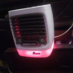 A Nice Air Conditioner Fan Lights Up Different Colors