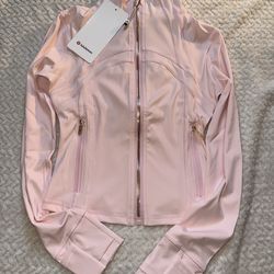 Pink Lululemon with gold zipper