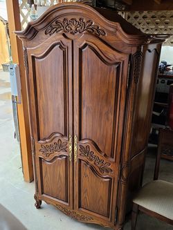 Solid oakwood armoire...cost 4,800