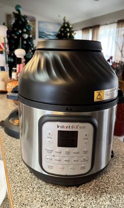 Instant Pot® Duo™ Crisp™ + Air Fryer 6QT Multi-Use Pressure Cooker double lid.